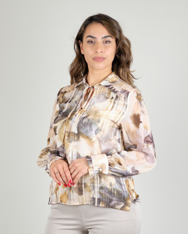 Blusa floral con laccetto