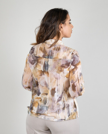 Blusa floral con laccetto