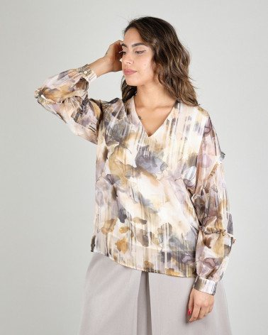 Blusa floral con rouches