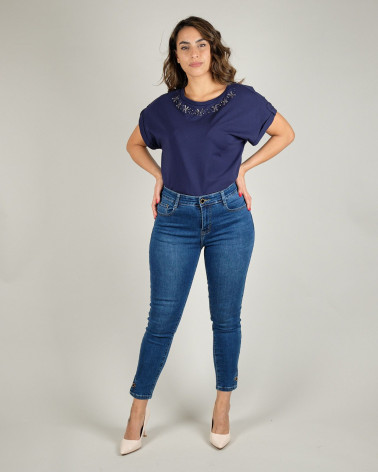 Jeans skinny con bottone