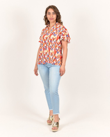 BLUSA CON COLLETTO IN FANTASIA GEOMETRICA