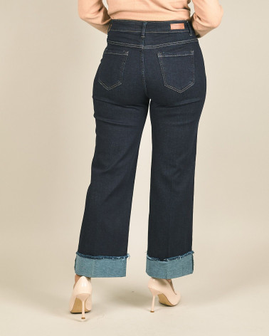 Jeans cropped in denim scuro con risvolto