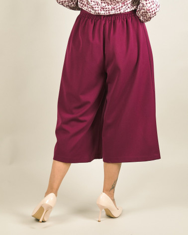 Pantaloni capri a palazzo bordeaux con fiocco