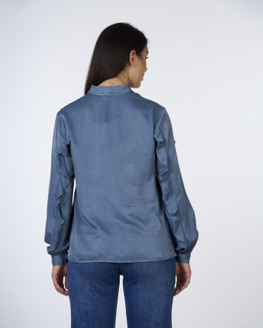 Blusa ottanio con fiocco e rouches