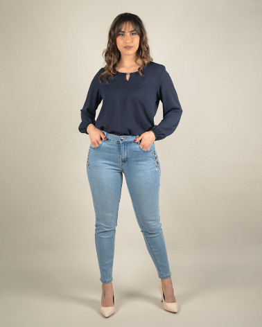Jeans skinny con applicazioni gioiello