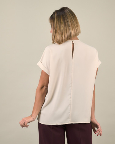 Blusa con spalle in paillettes