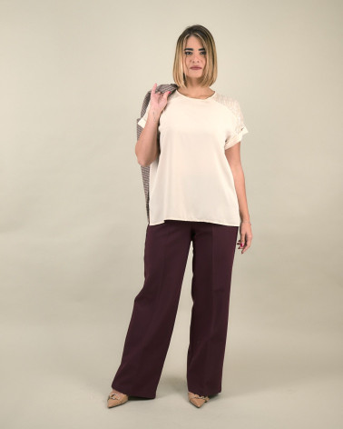 Blusa con spalle in paillettes