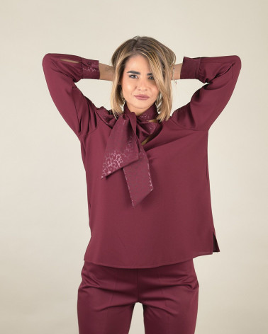 Blusa con fiocco e dettagli jacquard