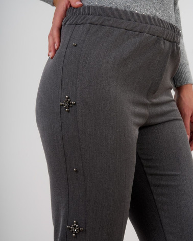 Pantaloni grigi con applicazioni gioiello laterali