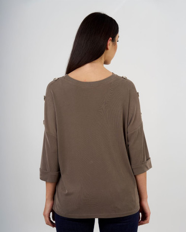 Maglia ampia con bottoni decorativi sulle maniche