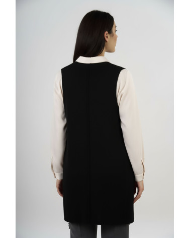 Gilet lungo in maglia con tasche