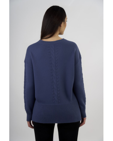 Maglia con lavorazione trecce e fondo asimmetrico