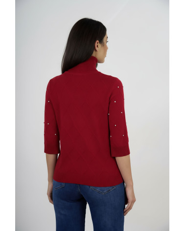 Maglia con trama a rombi e applicazioni gioiello