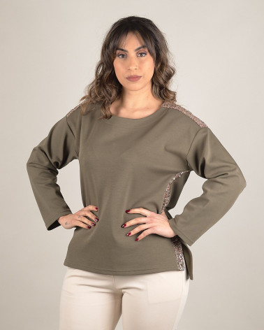 Maglia verde con dettagli in paillettes