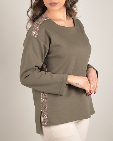 Maglia verde con dettagli in paillettes