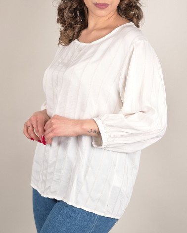 Blusa bianca elegante con motivi decorativi