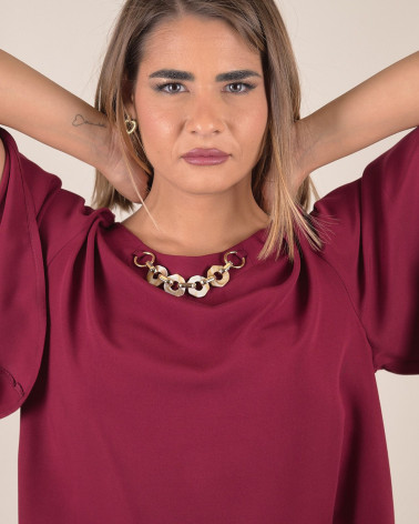 Blusa manica ampia con dettaglio al collo