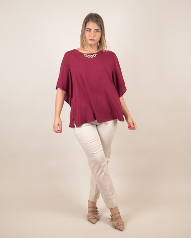 Blusa manica ampia con dettaglio al collo