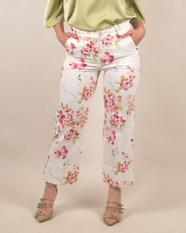 Pantaloni con motivo fiorito e risvolto