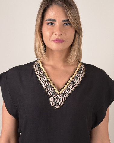 Blusa manica ad aletta con scollo conchiglie