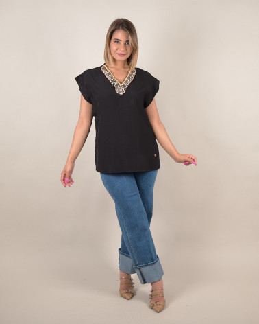 Blusa manica ad aletta con scollo conchiglie