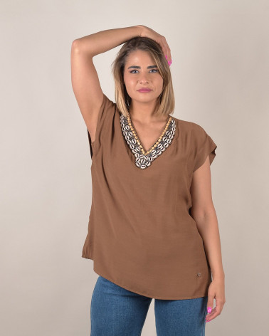 Blusa manica ad aletta con scollo conchiglie