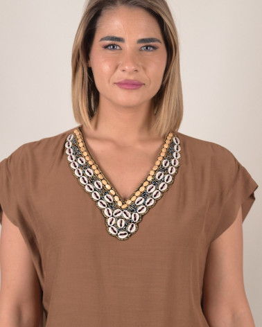 Blusa manica ad aletta con scollo conchiglie
