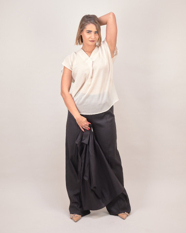 Blusa in cotone beige con motivo posteriore