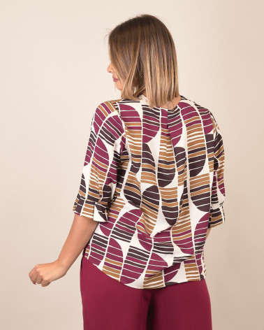 Blusa fantasia con scollo a V