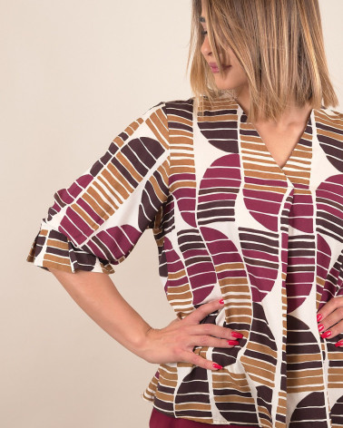 Blusa fantasia con scollo a V