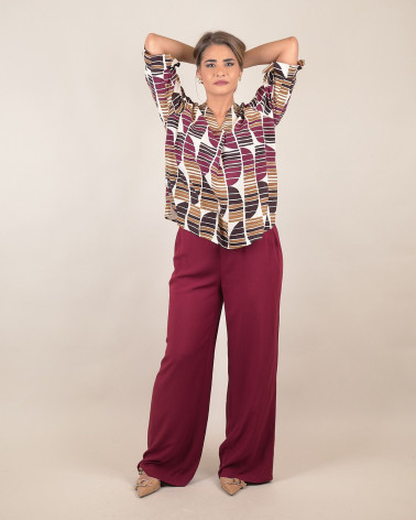 Blusa fantasia con scollo a V