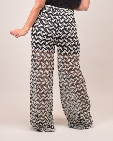 Pantaloni palazzo traforati con motivo zig-zag