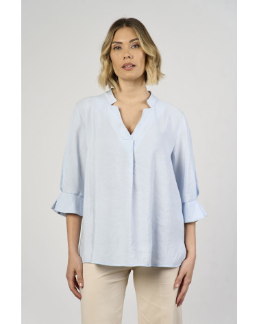 Blusa azzurra in modal con maniche a volant